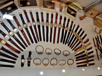 display of wristwatches in an arch shape