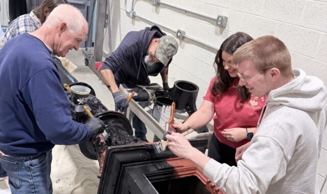 Volunteers and NAWCC staff painted the base.